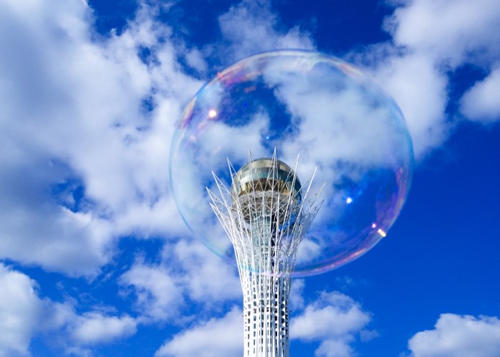 Bayterek Tower caught inside a soap bubble.